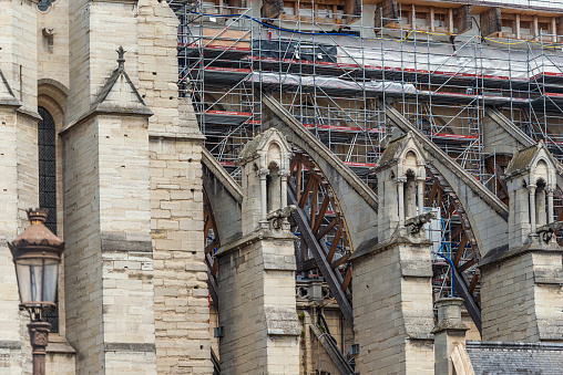 Paris, France - May 19, 2023: Closeup of Notre-Dame de Paris construction site in May 2023. Notre-Dame de Paris (meaning \