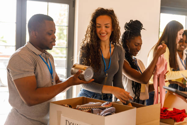 istock Volunteers working together to organize boxes with donations 1503273727