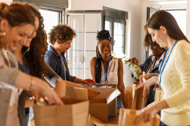 istock Volunteers creating care packages during a food drive 1503278034