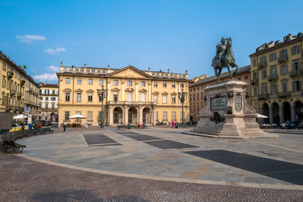 Turin, Italy - June 27 2023: Bodoni Square in Turin. The statue of the General Alfonso La Marmora can be seen in the centre of the picture (by Stanislao Grimaldi) The Music Conservatory Giuseppe Verdi is in the background.