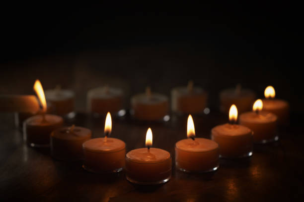 istock setting tealight candles in a shape of a heart 1503285536