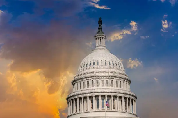 US Capitol in Washington DC in dramatic sunset, USA