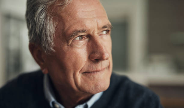 istock Elderly man, profile and thinking about future, retirement and pension with headshot, mockup space and aging. Male person at home, pensioner and relax, planning old age and memory of life experience 1503289357
