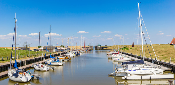 Panorama of sailing yachts in the harbor of Termunterzijl, Netherlands