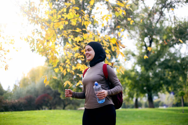 Middle-eastern female walking in nature. About 25 years old, Arab woman.