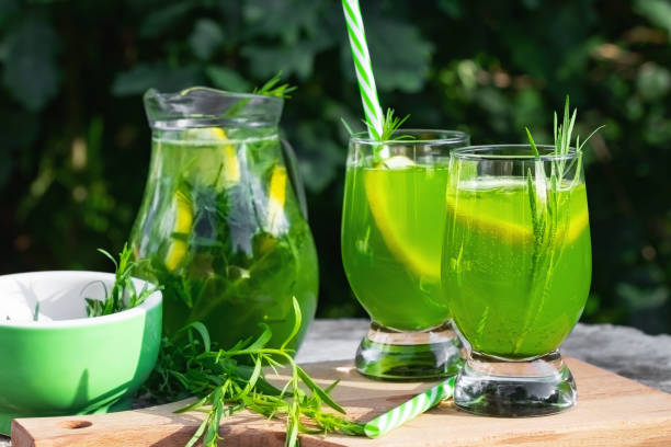 istock Homemade summer refreshing tarragon lemon drink on patio table 1503298837