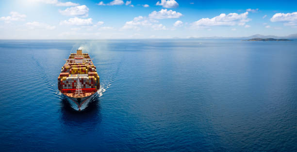 istock Front view of a large cargo ship carrying containers with copy space 1503298971
