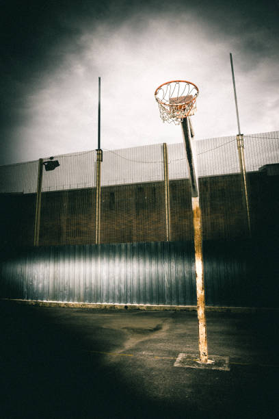 istock Disused Basketball Hoop In A Prison Imate Exercise Yard 1503305616
