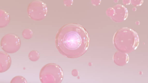 istock 3D cosmetic rendering Pink Bubbles of serum on a fuzzy background. 1503314668