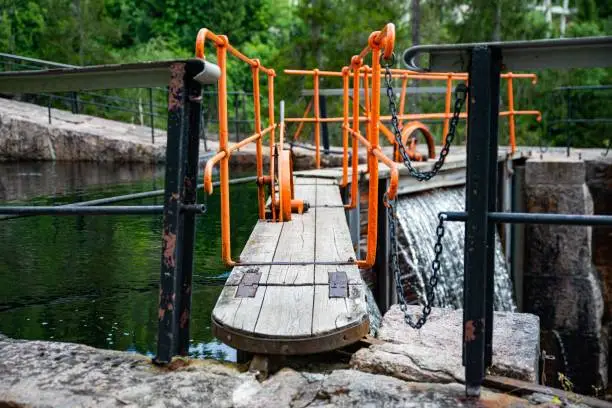 A closeup of a water lock for boat transportation over a lake in Telemark, Norway