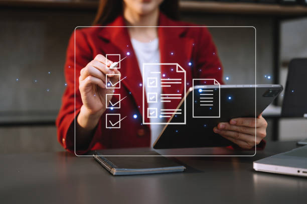 istock Checklist and filling survey form online. Document management system, DMS. Assessment form, questionnaire, checklist .Quality control and accuracy Check completeness.using a laptop and tablet 1503315483