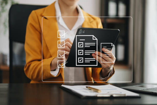istock Checklist and filling survey form online. Document management system, DMS. Assessment form, questionnaire, checklist .Quality control and accuracy Check completeness.using a laptop and tablet 1503315490