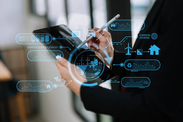 istock Businesswoman working virtual tablet computer twith reduce CO2 concept with icons, global warming such as reforest green factory recycle 1503315536
