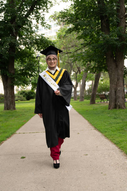 istock Young Woman Graduate in a Park 1503317407