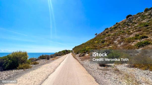 Footpath Vía Verde Del Mar Along The Mediterranean Sea On The Route Of Old Railway Line Between Benicassim And Oropesa Del Mar Stock Photo - Download Image Now