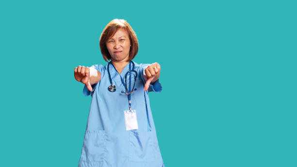 istock Nurse showing thumbs down sign 1503324737