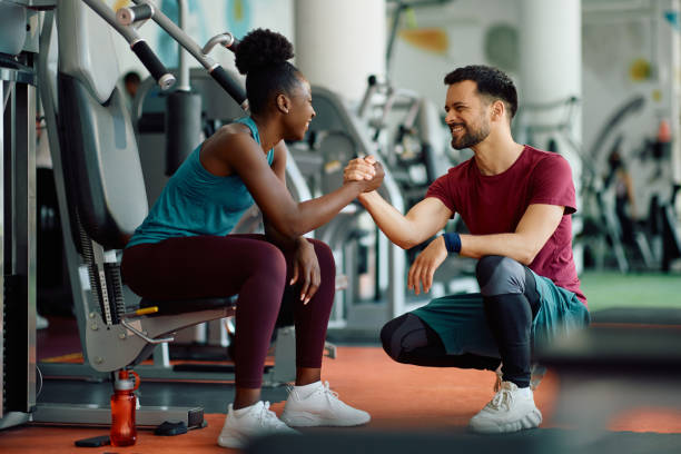 istock Young multiracial athletes supporting each other while working out in a gym. 1503325098