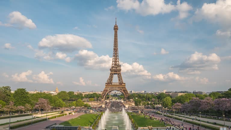 Paris France time lapse 4K, city skyline timelapse at Eiffel Tower and Trocadero Gardens