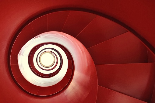 Spiral stairs red in golden section