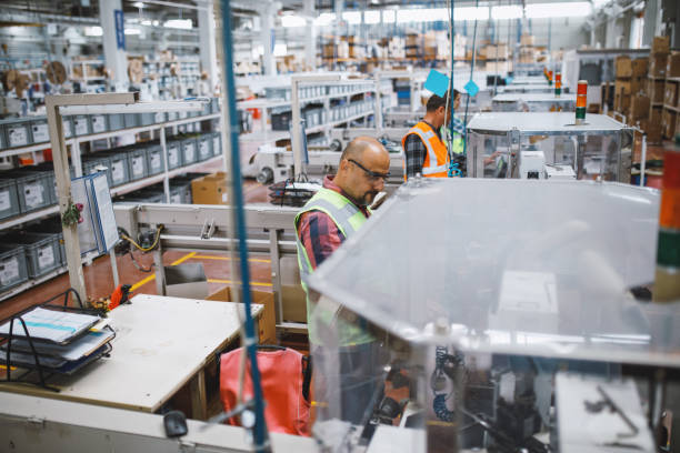 istock Industry employees work on production line at factory 1503339443