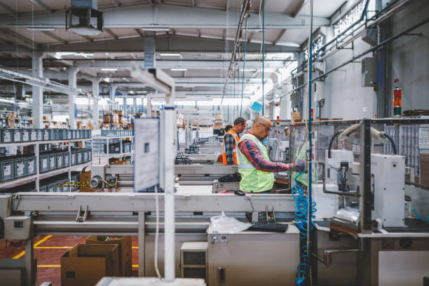 istock Industry employees work on production line at factory 1503341711