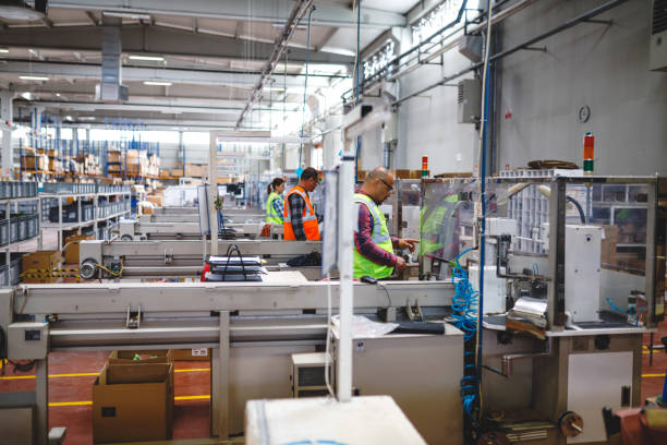 istock Industry employees work on production line at factory 1503341713