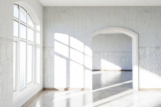 istock luxurious loft apartment with arched window and minimalistic interior living room design; 3D Illustration 1503342069