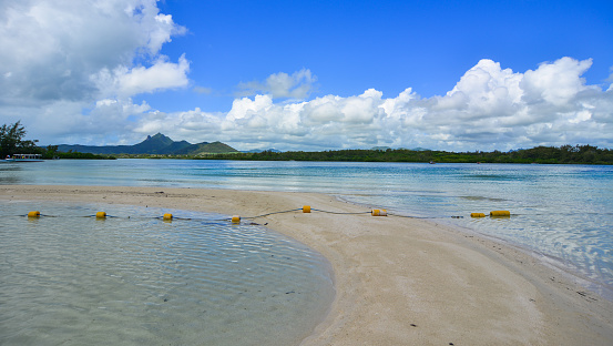 Summer day on Ile aux Cerfs Leisure Island, Mauritius. This island is a popular destination that attracts European tourists in the summer.