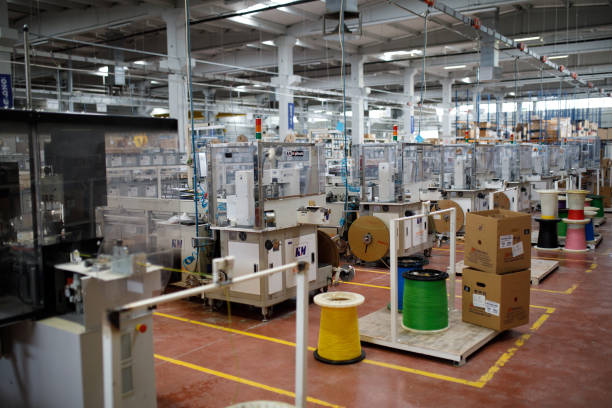 istock View of empty factory with electronics industry manufacturing equipments 1503346181