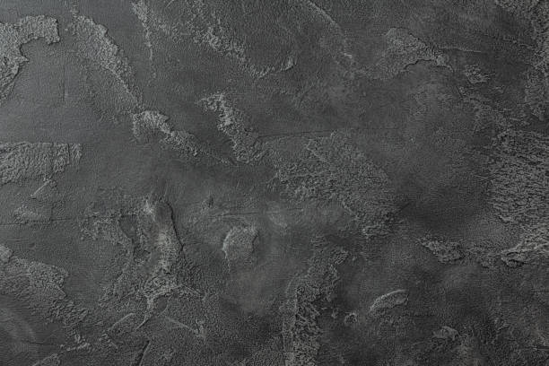 istock Gray stone background with patterns of various shapes and types. 1503346226
