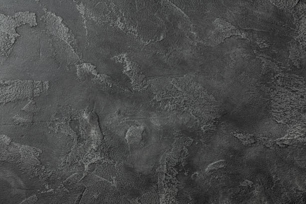 istock Gray stone background with patterns of various shapes and types. 1503346236