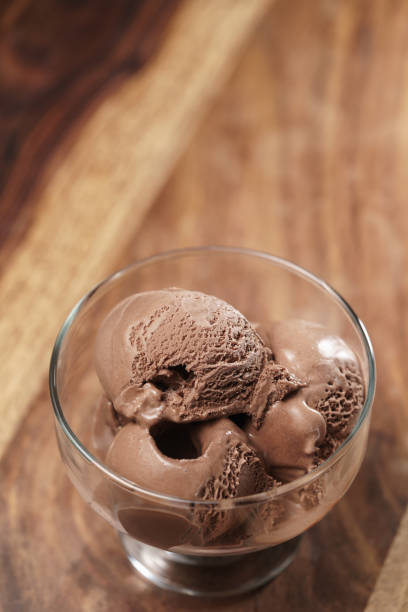 istock chocolate ice cream in glass bowl on wooden table 1503347199