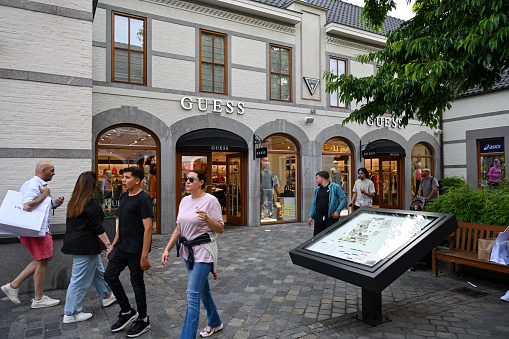 Roermond, Netherlands, June 27, 2023 -Guess store at Designer Outlet Roermond, a factory outlet center in the Dutch city of Roermond.