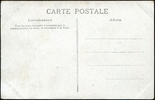 a vintage blank postcard printed in France in earlier 1900s,  ready for any usage of  historic events background related to mail delievery description.