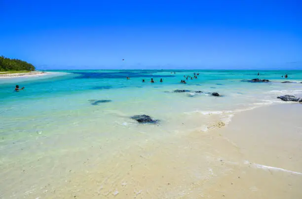Relaxing beach on Ile aux Cerfs Leisure Island, Mauritius. This island is a popular destination that attracts European tourists in the summer.