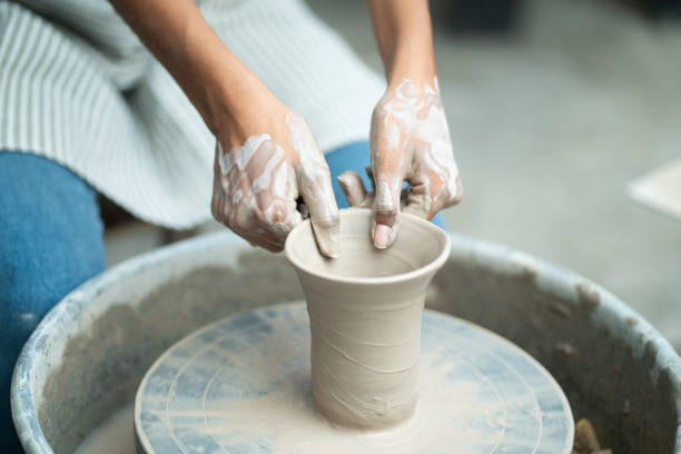 istock Craftsmanship Unleashed: African American Boy's Artistic Pursuit in Ceramic Studio 1503355764