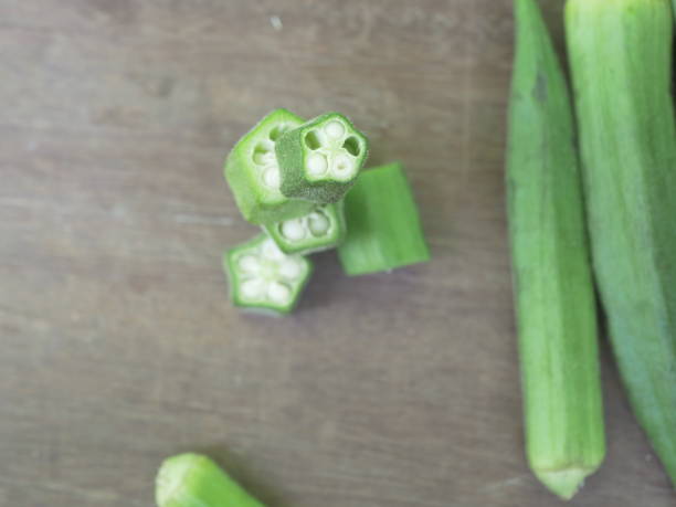 istock Okra cuts on center ,green vegetable 1503361318