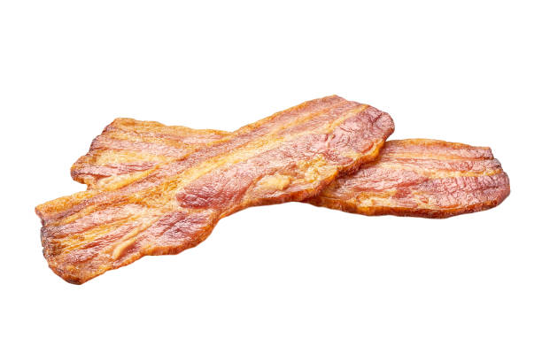 istock two fried bacon rashers isolated on white background. Fried pork bacon rashers isolated on white background. 1503367594