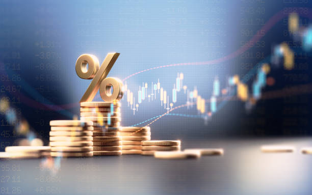 Percentage Sign On Top Of Coin Stacks Before Blue Financial Graph Percentage sign on top of coin stacks before blue financial graph. Horizontal composition with copy space. Business and finance concept. last money stock pictures, royalty-free photos & images