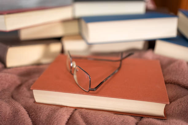 Old open book on a wooden table