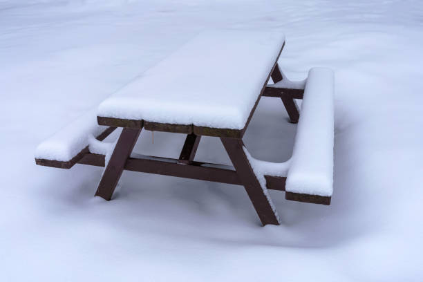 istock Snow covered wooden picnic table 1503373271