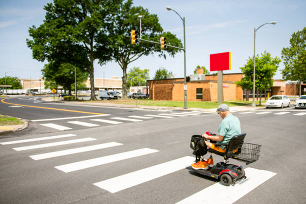 istock Senior on mobility scooter crossing the street 1503375784