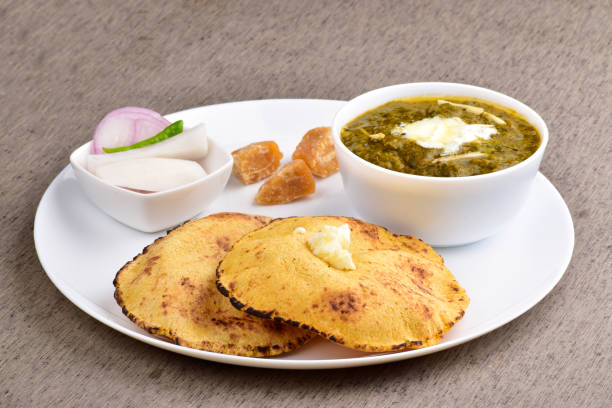 istock Punjabi meal saag and makki roti with salad in plate 1503376055