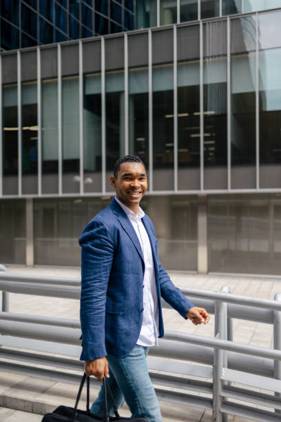 istock Man walking through financial area with briefcase 1503378608