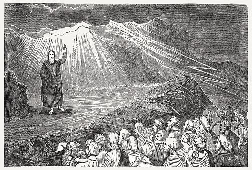 Israel hears the Ten Commandments of God down at Mount Sinai (Exodus 19 - 24). Wood engraving, published in 1835.