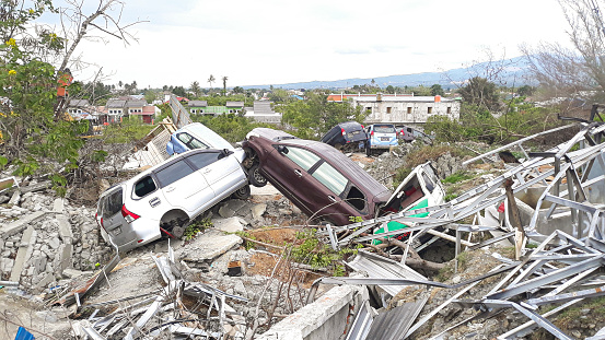 The appearance of heavily damaged cars due to the earthquake, tsunami, and liquefaction in Donggala, Palu, Central Sulawesi September 2018