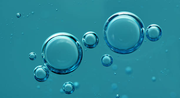 istock Air bubbles in turquoise liquid. Abstract water background. Underwater texture. Macro 1503390629