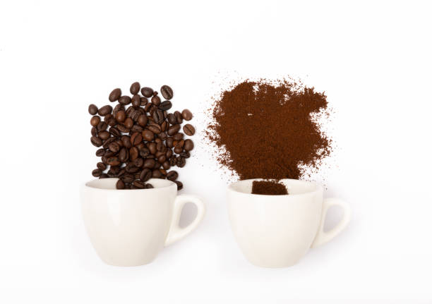 istock Ground coffee and beans in coffee cups in bulk isolated on a white background. 1503390951