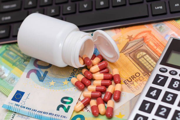 istock Ordering Medicines. Pills and Capsules on the Euro Banknotes 1503392353