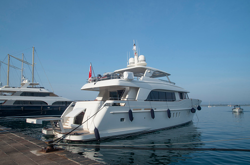 Luxury and modern yacht in port in Europe